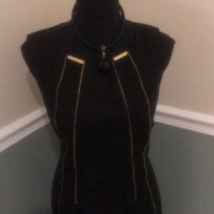 Little black number with gold zips